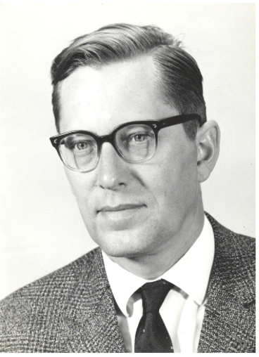 black and white image of a man wearing glasses
